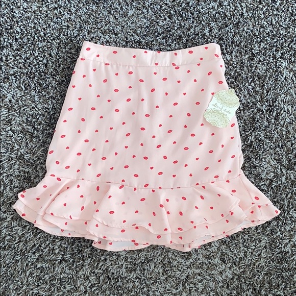 Altar'd State Dresses & Skirts - High waisted mini skirt with ruffle detail